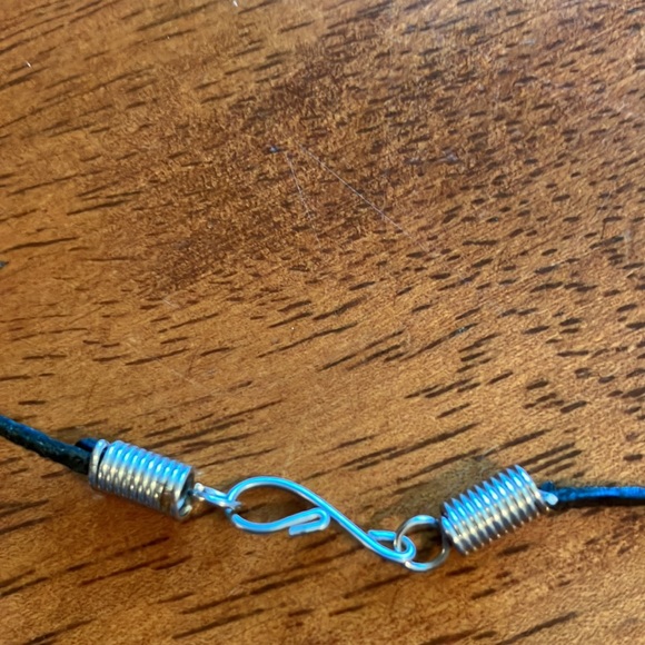 Beautiful boho style necklace with chunky blue stone cross on a leather cord. - Picture 10 of 16